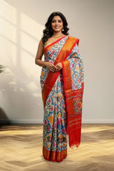 white and Golder Patola Saree