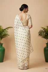 White organza saree with Polka dots