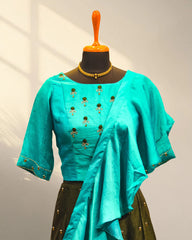 Green lehenga with half sleeve and with ruffles duppata