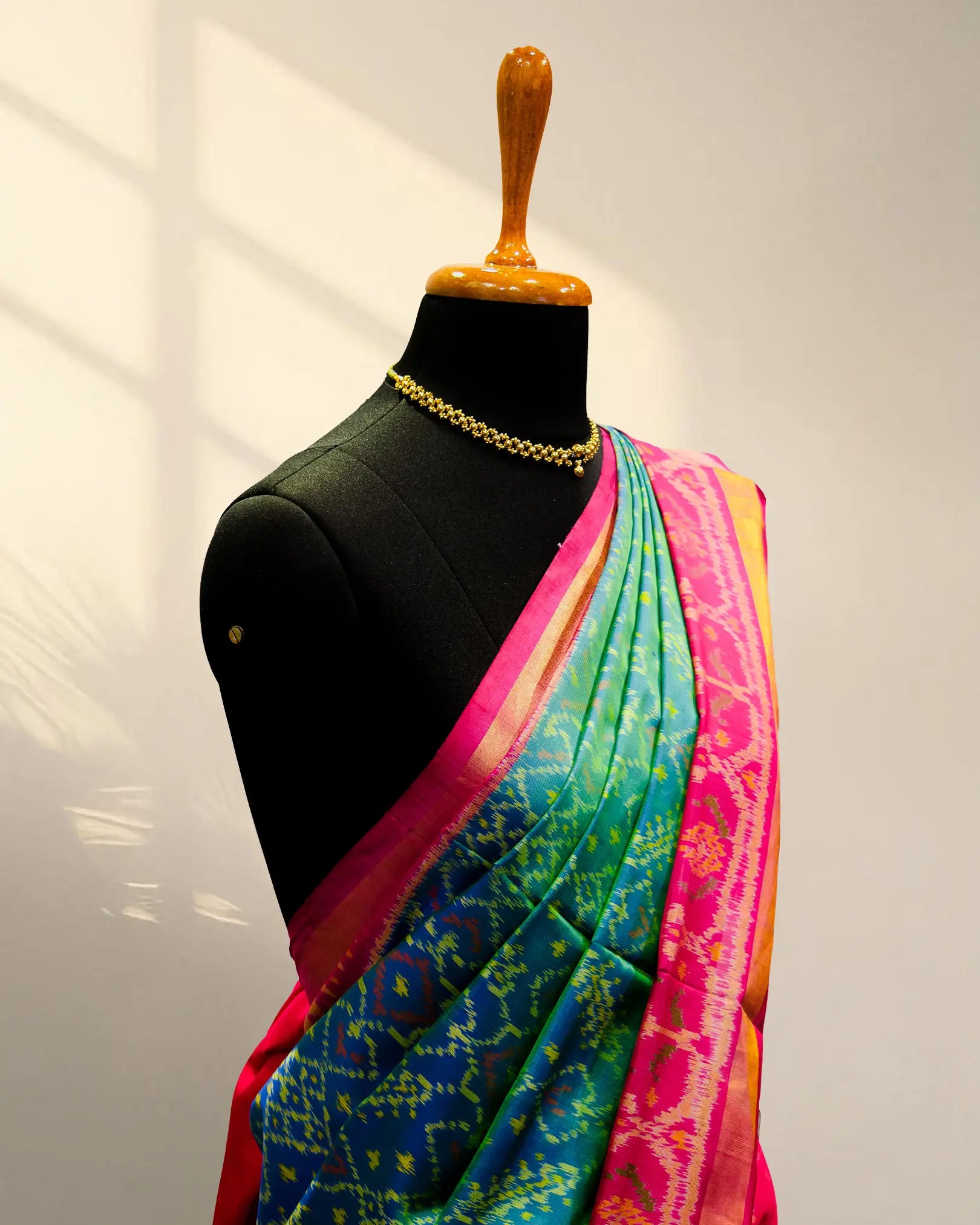 Green and pink Patola Saree