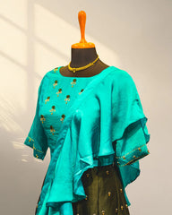Green lehenga with half sleeve and with ruffles duppata