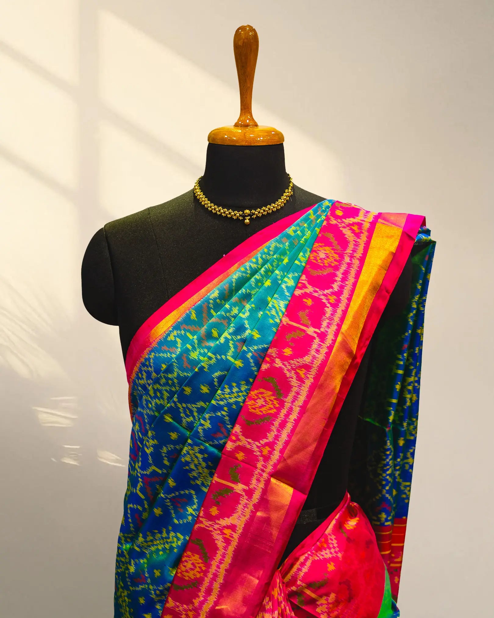 Green and pink Patola Saree