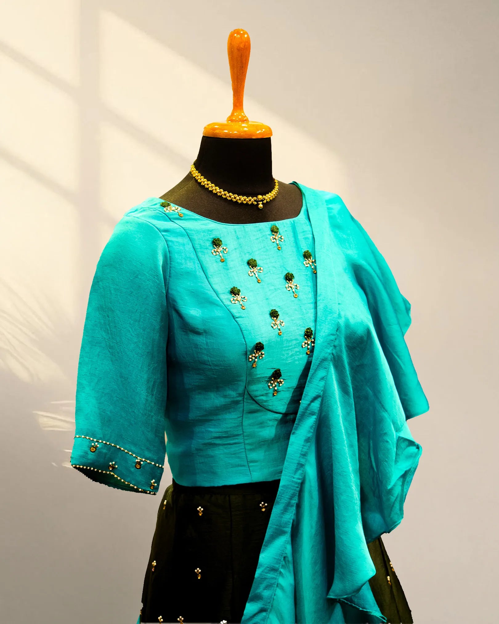Green lehenga with half sleeve and with ruffles duppata