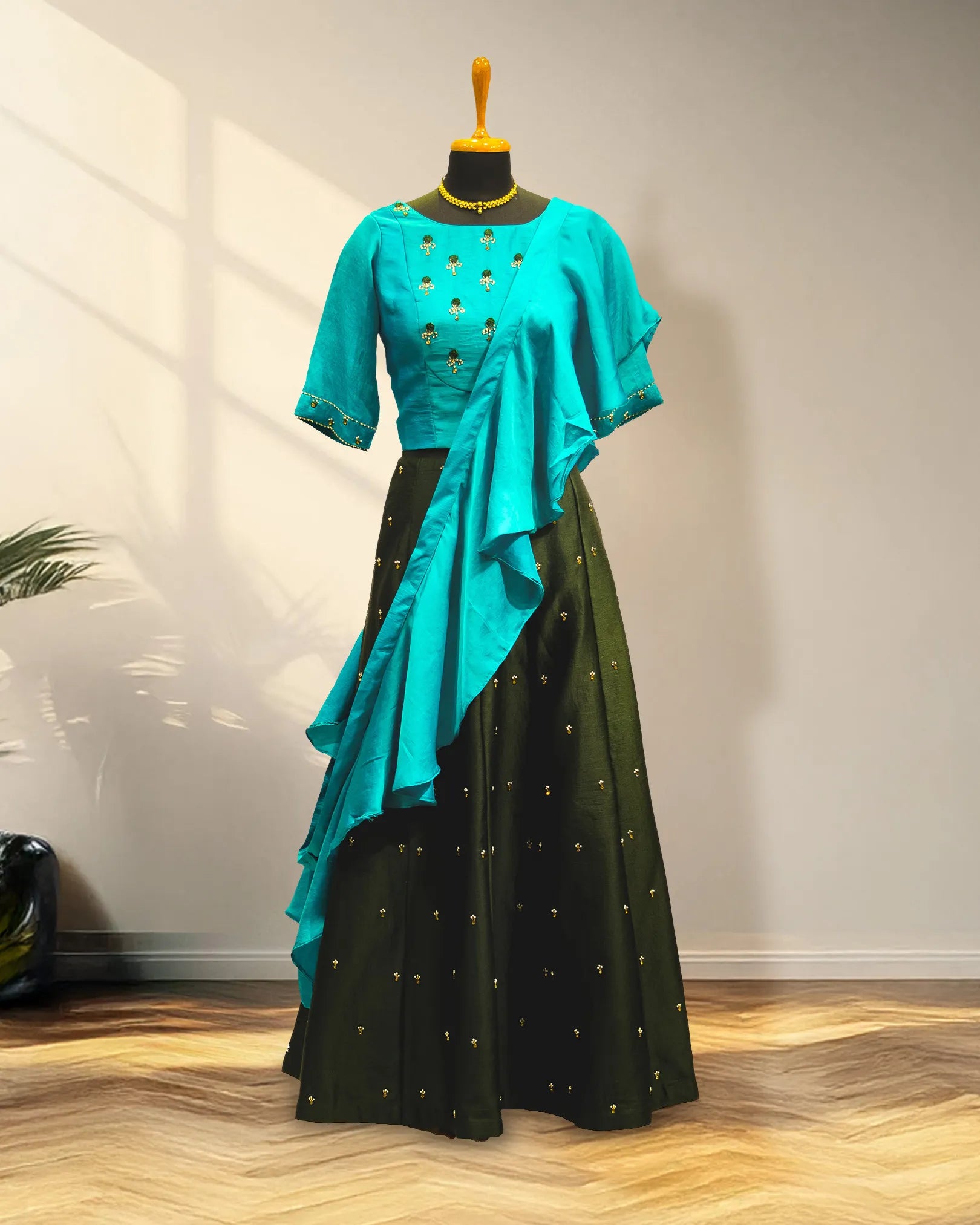 Green lehenga with half sleeve and with ruffles duppata