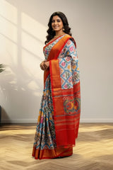 white and Golder Patola Saree