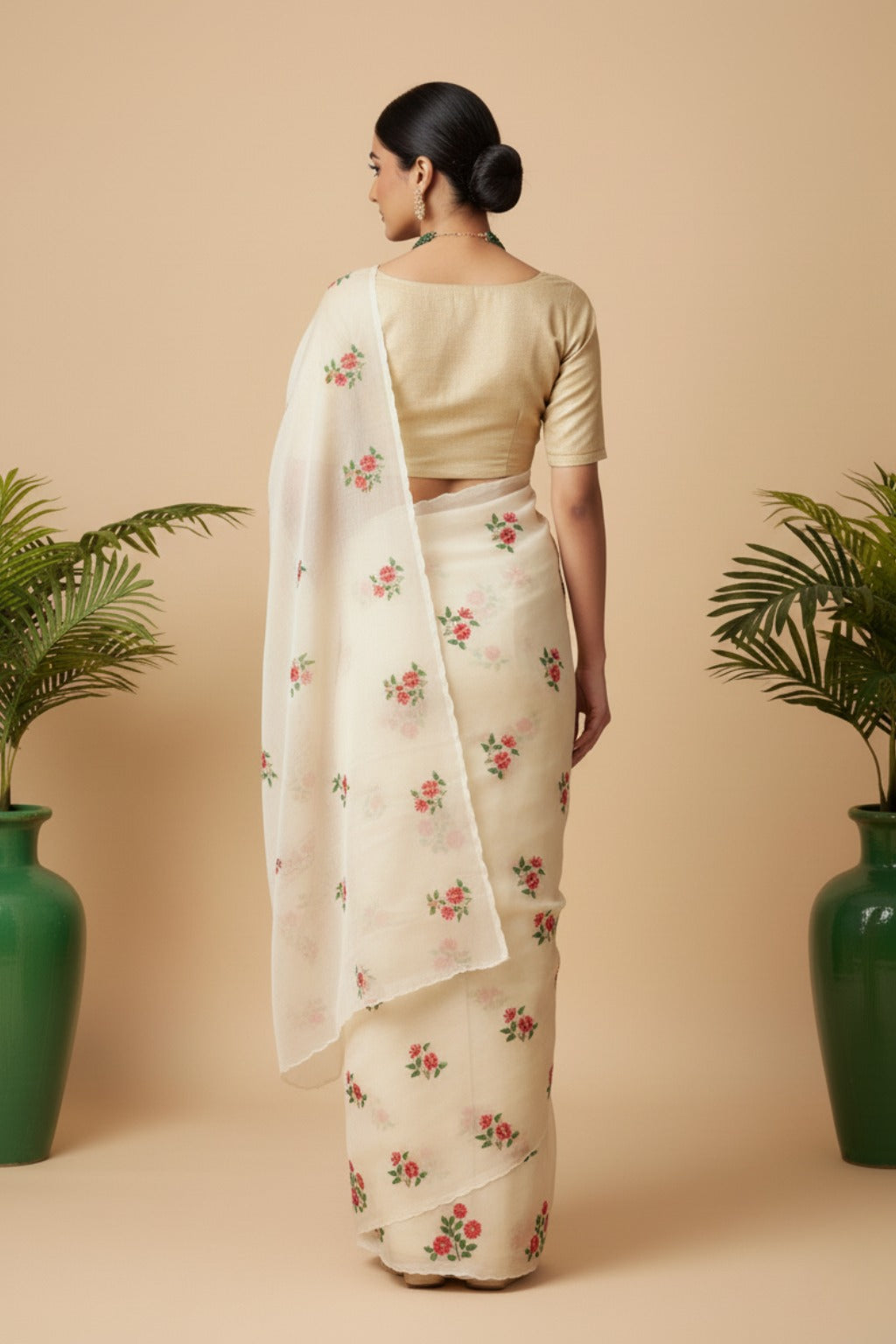 White organza saree with floral embroidery work