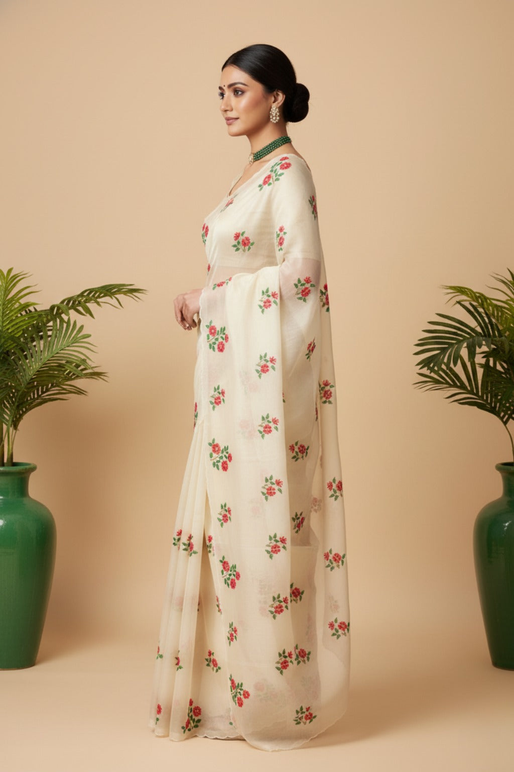 White organza saree with floral embroidery work